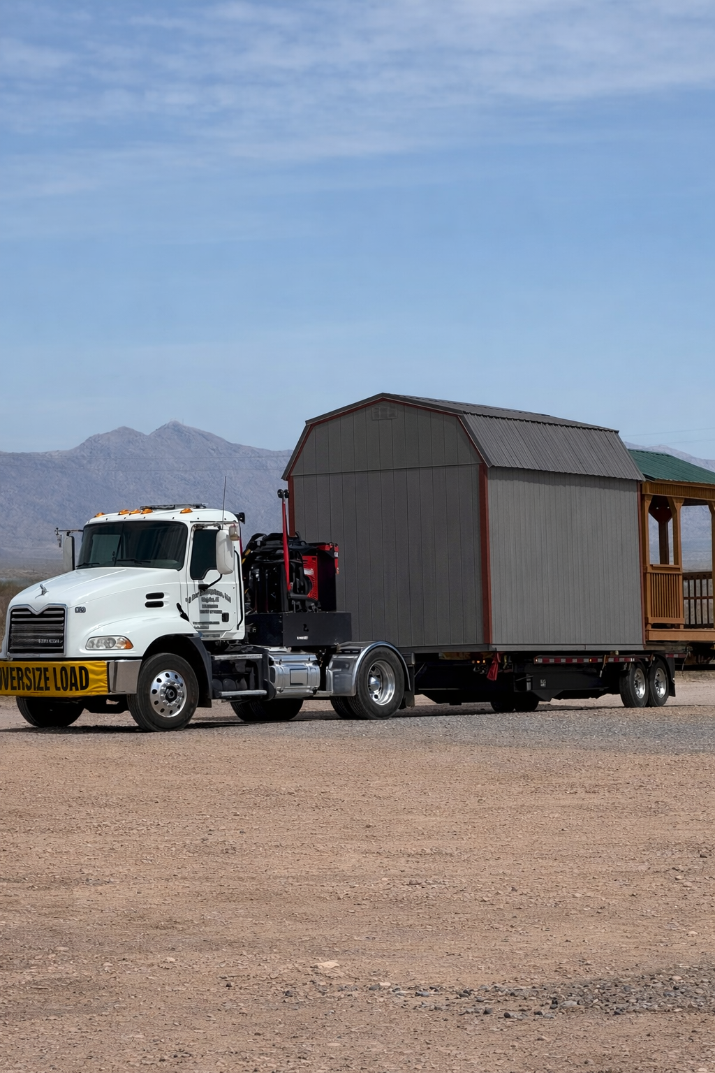Portable building delivery and hauling